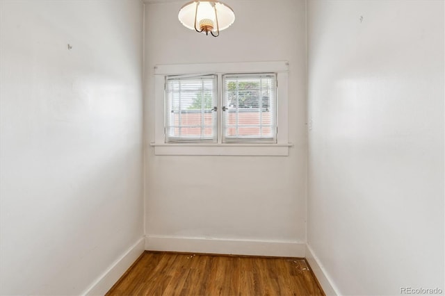 869 S Williams St, Denver, CO 80209 - empty room with baseboards and wood finished floors