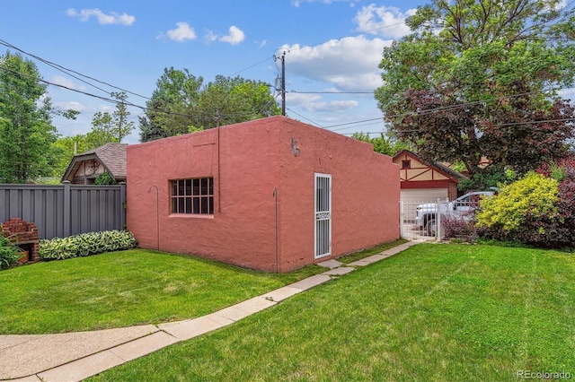 869 S Williams St, Denver, CO 80209 - view of property exterior featuring stucco siding and an outdoor structure