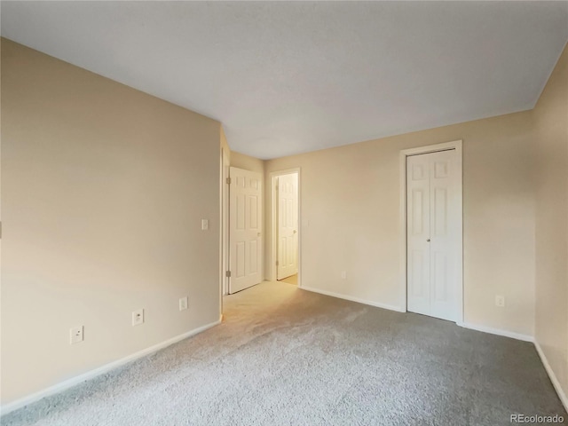 unfurnished bedroom featuring carpet floors