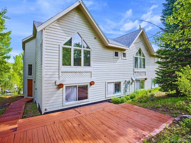 0251 Fawn Ct, Silverthorne, CO 80498 - back of property with a deck and a shingled roof