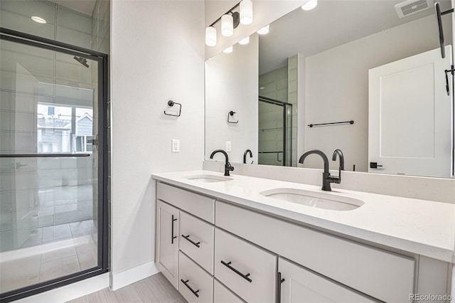 bathroom featuring vanity and walk in shower