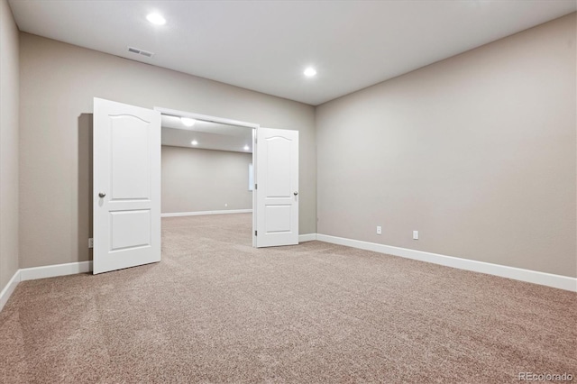 view of carpeted spare room