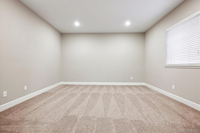 empty room featuring carpet floors