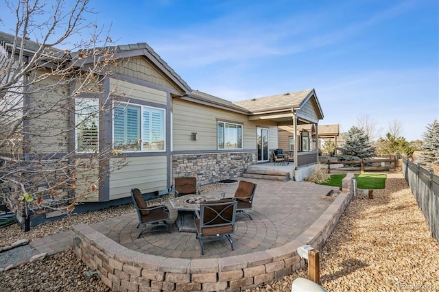 view of patio featuring a fire pit