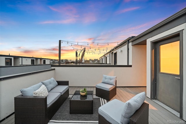 view of patio featuring outdoor lounge area and a balcony