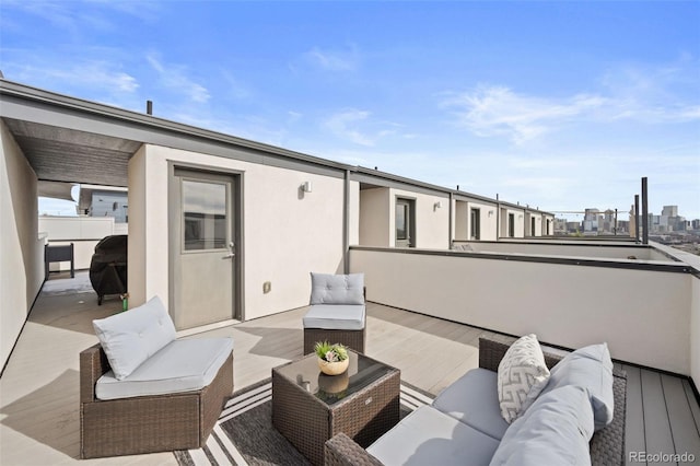 view of patio featuring an outdoor hangout area and a balcony