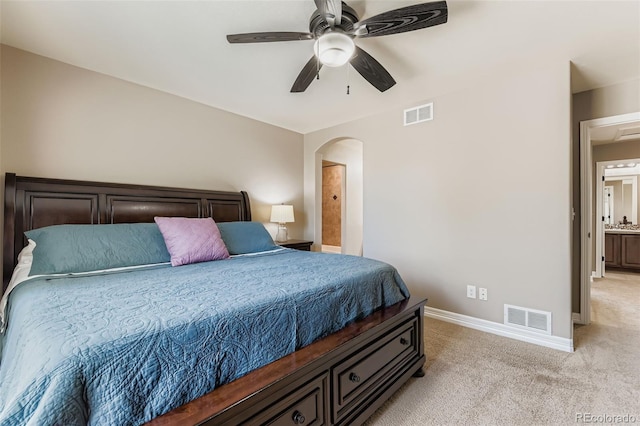 12763 E 105th Pl, Commerce City, CO 80022 - bedroom featuring light carpet, arched walkways, and a ceiling fan