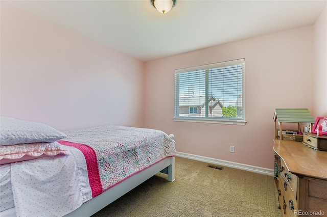 12763 E 105th Pl, Commerce City, CO 80022 - carpeted bedroom with baseboards