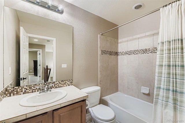 12763 E 105th Pl, Commerce City, CO 80022 - full bathroom with shower / bath combo, vanity, and a textured wall