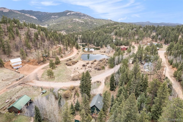 12569 S Parker Ave, Pine, CO 80470 - birds eye view of property featuring a view of trees and a water and mountain view