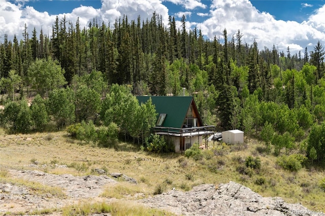 63 Welsh Cob Ln, Jefferson, CO 80456 - view of yard featuring a forest view