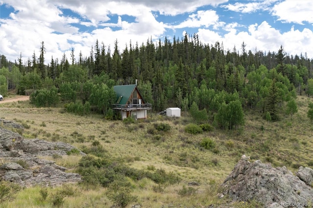 63 Welsh Cob Ln, Jefferson, CO 80456 - view of yard with a view of trees