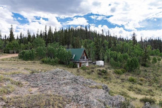 63 Welsh Cob Ln, Jefferson, CO 80456 - view of yard with a view of trees