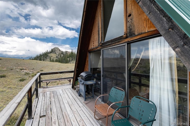 63 Welsh Cob Ln, Jefferson, CO 80456 - wooden terrace with grilling area and a rural view