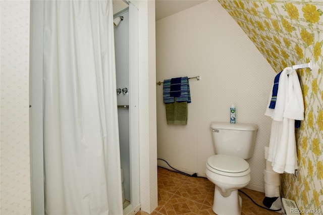 63 Welsh Cob Ln, Jefferson, CO 80456 - full bathroom featuring a shower stall, wallpapered walls, and tile patterned floors