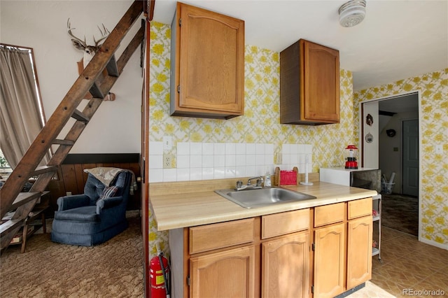 63 Welsh Cob Ln, Jefferson, CO 80456 - kitchen with wallpapered walls and light countertops