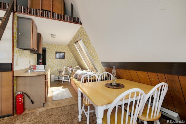 63 Welsh Cob Ln, Jefferson, CO 80456 - dining room featuring wallpapered walls and a baseboard heating unit