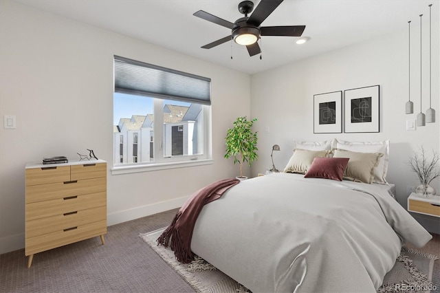 carpeted bedroom with a ceiling fan, recessed lighting, and baseboards