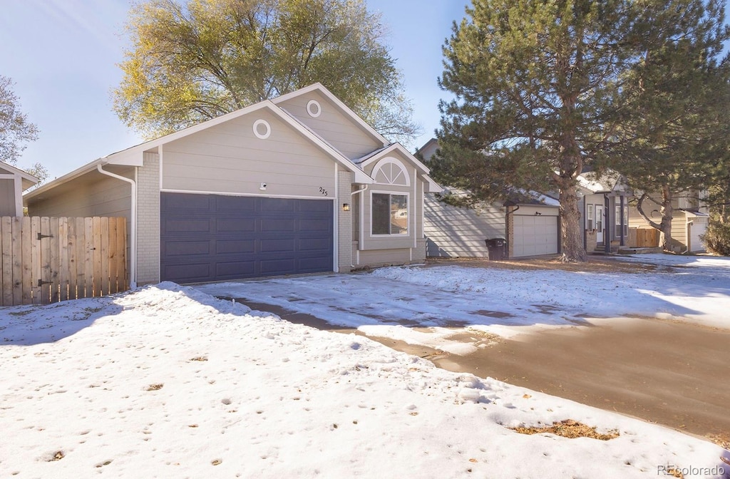 view of snow covered garage