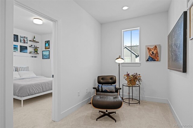 sitting room featuring recessed lighting, baseboards, and carpet floors