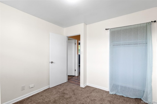 600 Bronco Rd, Denver, CO 80221 - unfurnished bedroom with carpet flooring and a closet