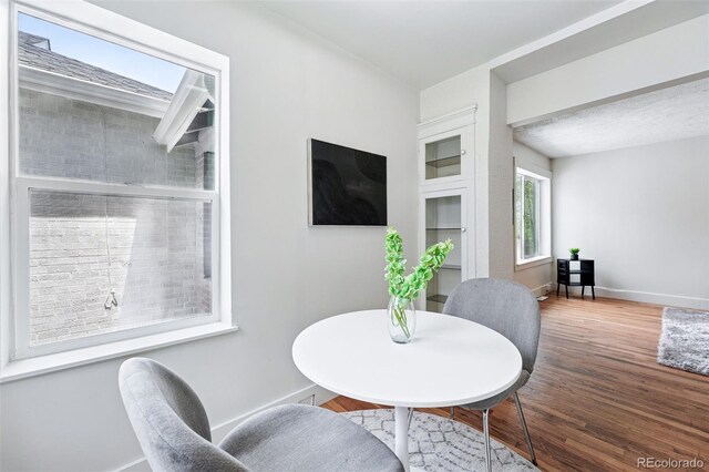 3344 W 33rd Ave, Denver, CO 80211 - dining area featuring wood finished floors and baseboards