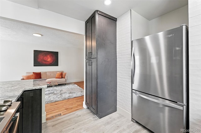 3344 W 33rd Ave, Denver, CO 80211 - kitchen featuring freestanding refrigerator, light wood-style flooring, open floor plan, baseboards, and recessed lighting
