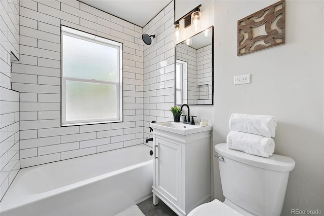 3344 W 33rd Ave, Denver, CO 80211 - bathroom featuring toilet, vanity, and tub / shower combination