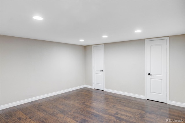 basement featuring dark hardwood / wood-style floors