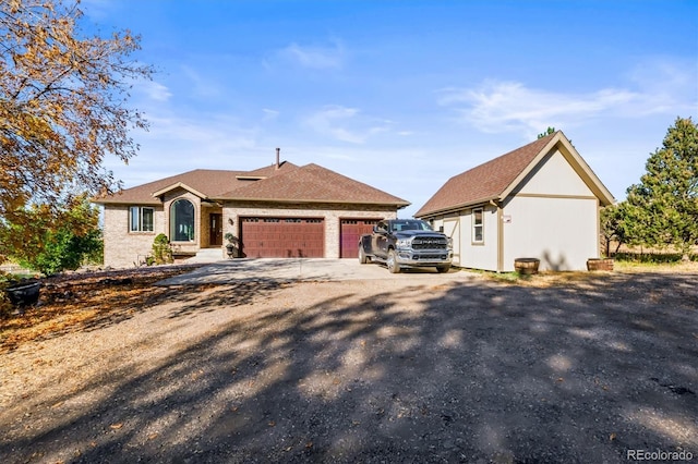 ranch-style home with a garage