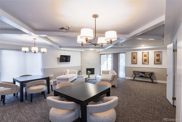 dining room with a chandelier, coffered ceiling, visible vents, and baseboards