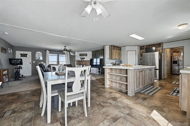 30890 Ken Vw, Yoder, CO 80864 - dining space with a ceiling fan and stone tile floors