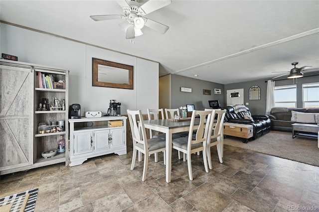 30890 Ken Vw, Yoder, CO 80864 - dining space featuring a ceiling fan and stone tile flooring