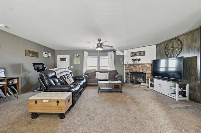 30890 Ken Vw, Yoder, CO 80864 - living area with carpet flooring, a ceiling fan, and a fireplace