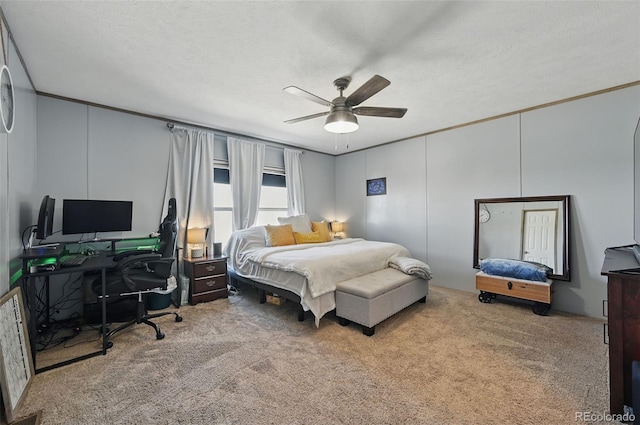 30890 Ken Vw, Yoder, CO 80864 - carpeted bedroom featuring an office area, ceiling fan, and a textured ceiling
