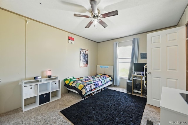 30890 Ken Vw, Yoder, CO 80864 - bedroom featuring light carpet and ceiling fan