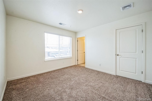 view of carpeted empty room