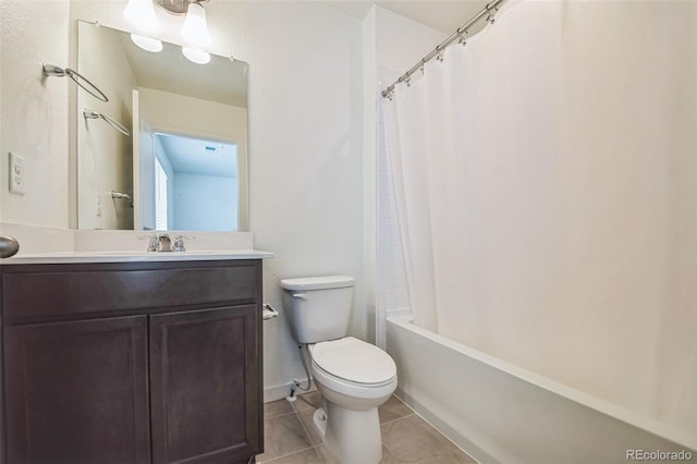 full bathroom featuring tile patterned flooring, vanity, toilet, and shower / tub combo with curtain