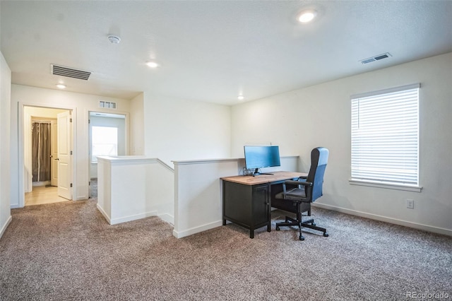 view of carpeted office space