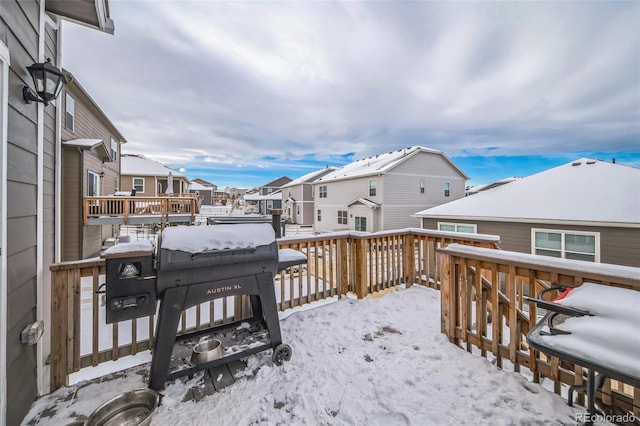 view of snow covered deck