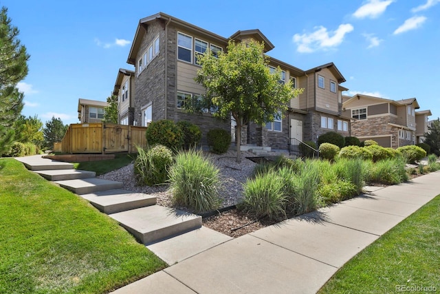 view of home's exterior featuring a lawn and a garage