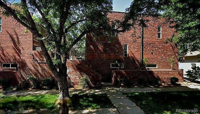 805 E 7th Ave Unit 8, Denver, CO 80218 - view of side of property featuring brick siding