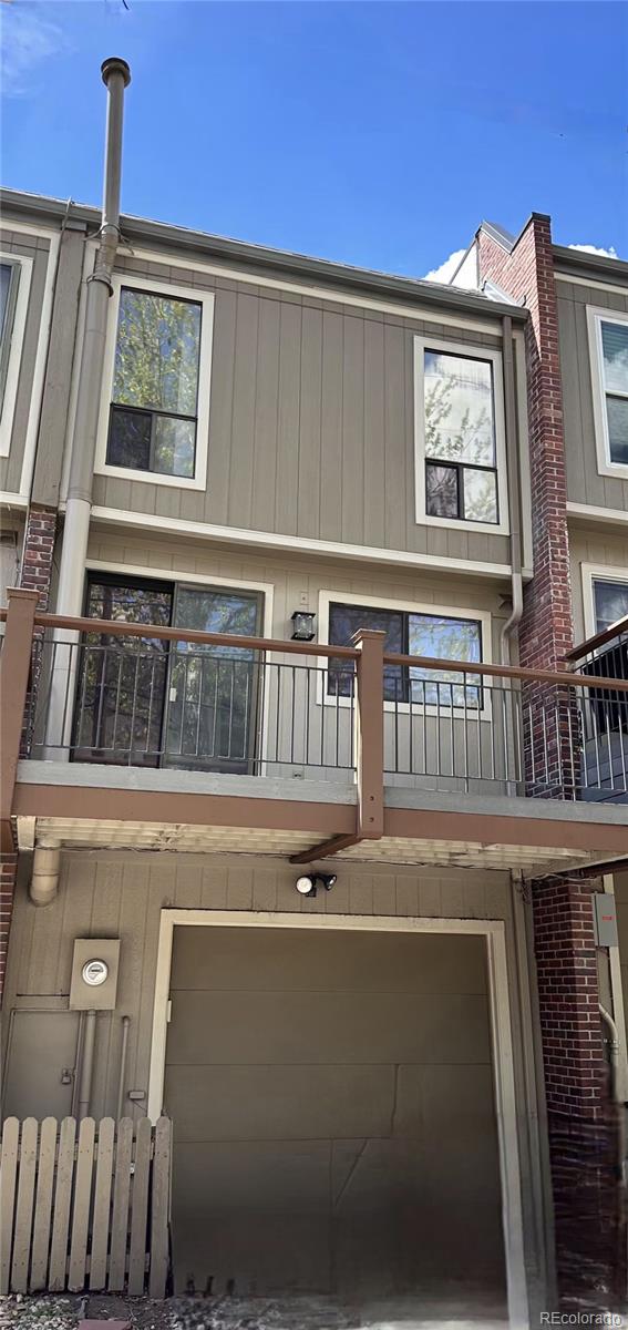 805 E 7th Ave Unit 8, Denver, CO 80218 - view of front facade featuring a balcony and an attached garage