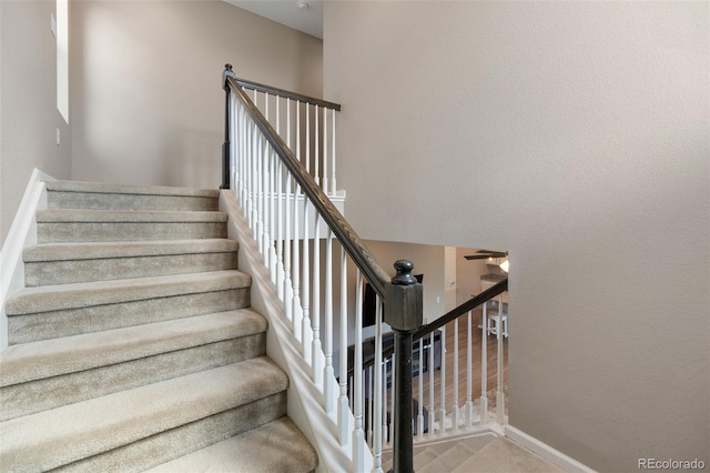 staircase with baseboards