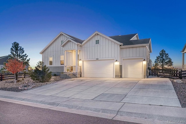 view of front of property with a garage