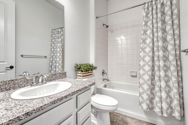 full bathroom featuring tile patterned flooring, shower / bath combination with curtain, vanity, and toilet