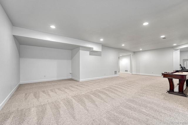 basement with light carpet