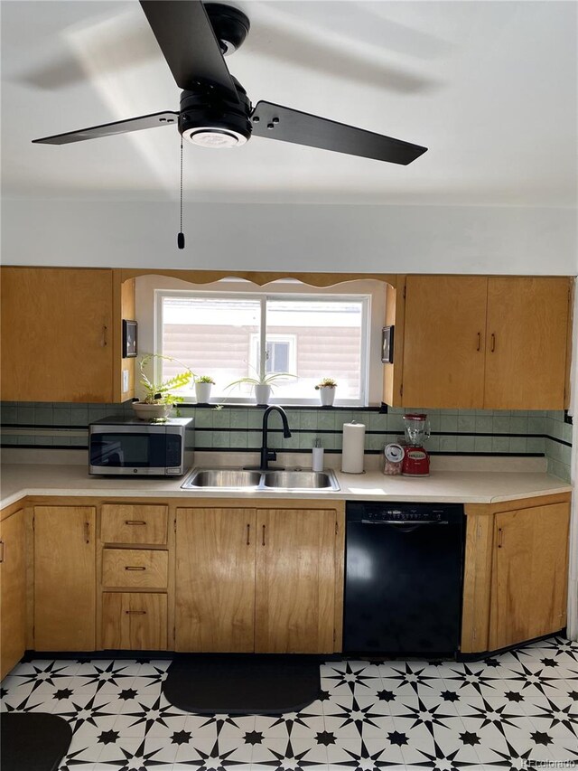 kitchen with ceiling fan, light tile patterned floors, sink, and dishwasher