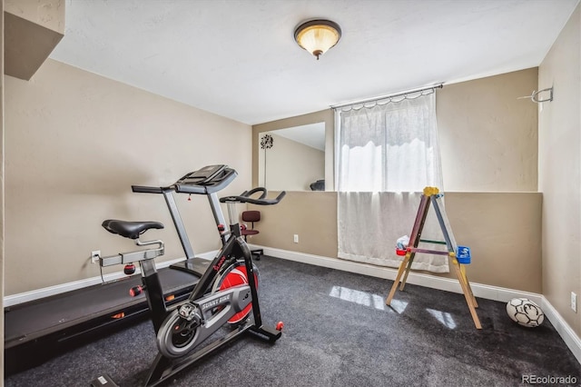 exercise room with carpet floors