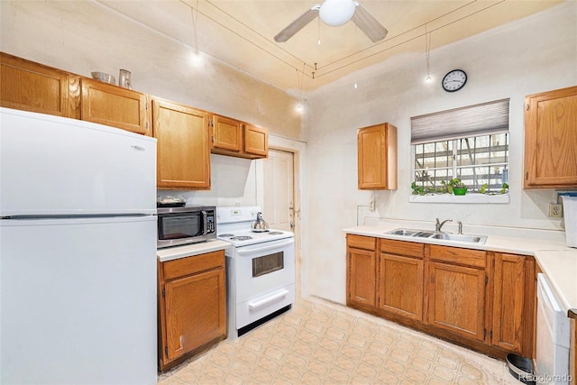 2350 N Ogden St, Denver, CO 80205 - kitchen with white appliances, a sink, light countertops, ceiling fan, and brown cabinets